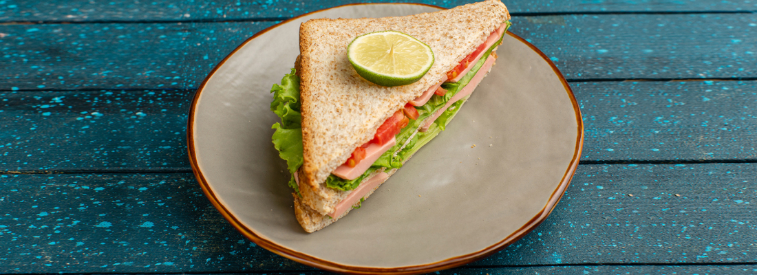 Healthy sandwich representing balanced energy for weight loss.